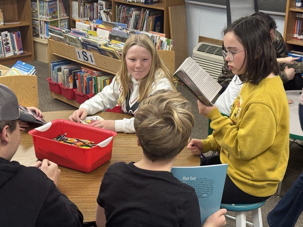 📚✨ More heartwarming moments from our Miracle of Books event! High school students reading with our elementary kids is truly magical. ❤️ Thank you to everyone who made this event so special! #MiracleOfBooks #ReadingConnections #SchoolTraditions