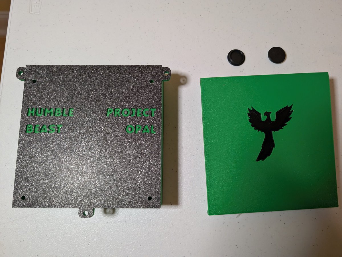 HumbleBeastKerr's tweet image. Finished the lid to the main circuit board today. I asked #Grok for a picture of an opal. Got this Phoenix cut opal and ran with it. I&apos;m really happy with my cable knockouts. If I had some black TPU that&apos;d be even better. #ProjectOpal #CnC #3Dprinting #Progress