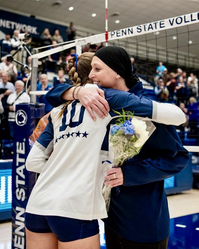Katie Schumacher-Cawley was an All-American at Penn State, then became head coach in 2022. 

This fall, she was diagnosed with breast cancer.

While battling cancer, she led her Nittany Lions to a championship—the first woman coach EVER to win an NCAA DI volleyball title.