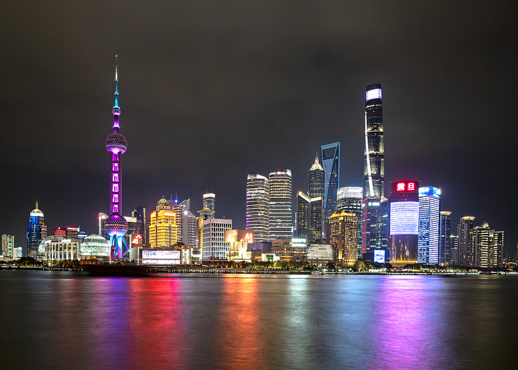 A quick edit from last night.. Looking across the Huangpu River from 'The Bund' towards the Shanghi business district with the 'Shanghai Tower' (Right of image) - being the official third tallest in the world.