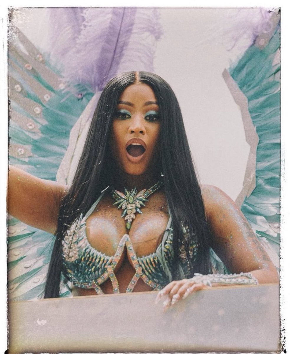 this pic of her @ carnival  >>