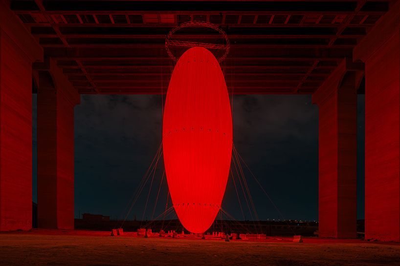 SpY's vast red ovoid suspends from bridge at noor riyadh for glowing gathering point designboom.com/art/spy-red-ov…