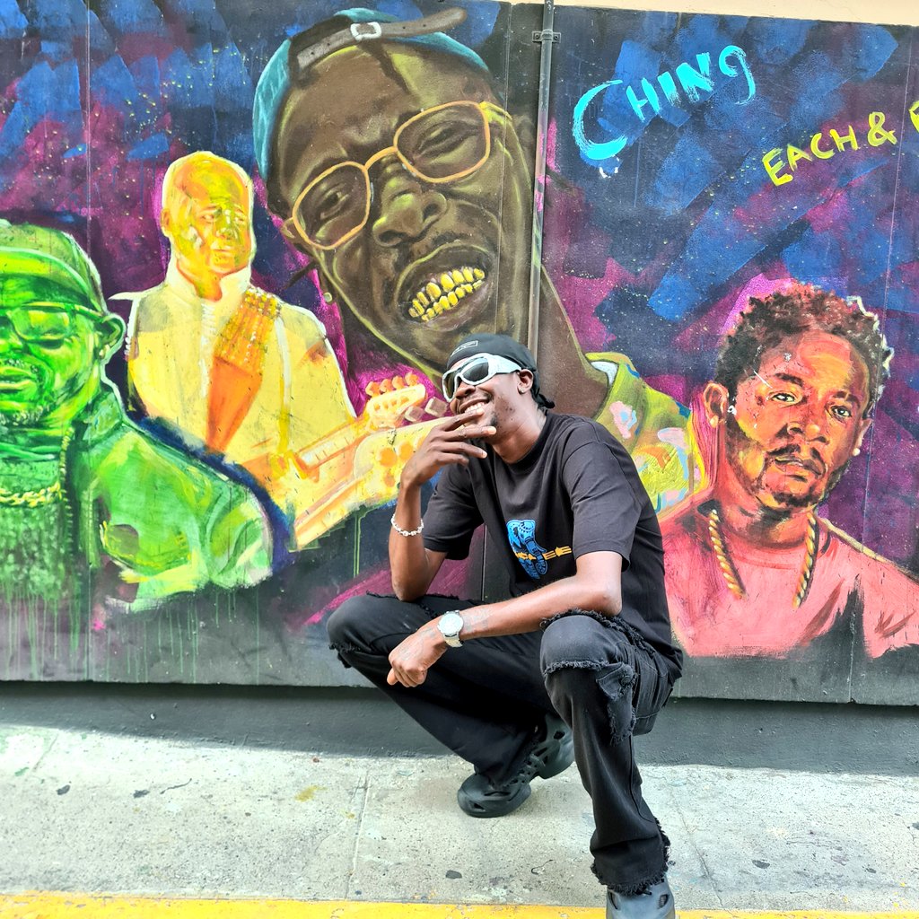 dempsterchung's tweet photo. That moment when @ChiChingChingJA finally saw his own mural on the Artwalk! Big up to Ching for giving @kgncreative the best performance of the year at the Artwalk Festival and to visual artist Sekani Daniel for the amazing artwork.
#PainttheCity #DowntownKingston
#streetart https://t.co/C8hZEcFF8I