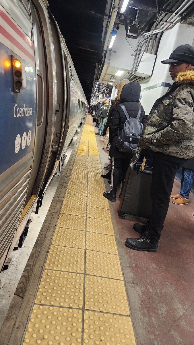 RunCoachMitch's tweet photo. @Amtrak @AmtrakNECAlerts, I'm not sure what's going on!!! In Philadelphia, you got us out here in the cold. https://t.co/o5y71tU4Ew