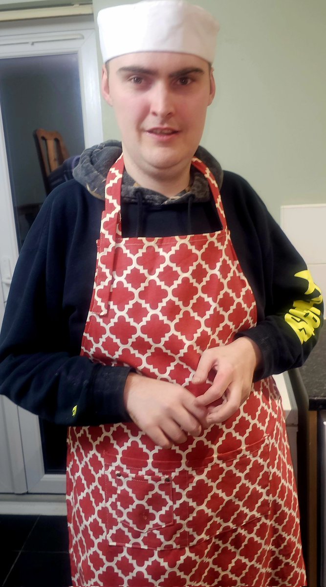 Ryan's trying on his new chef hat, ready to do some baking on Christmas Eve. 👨‍🍳