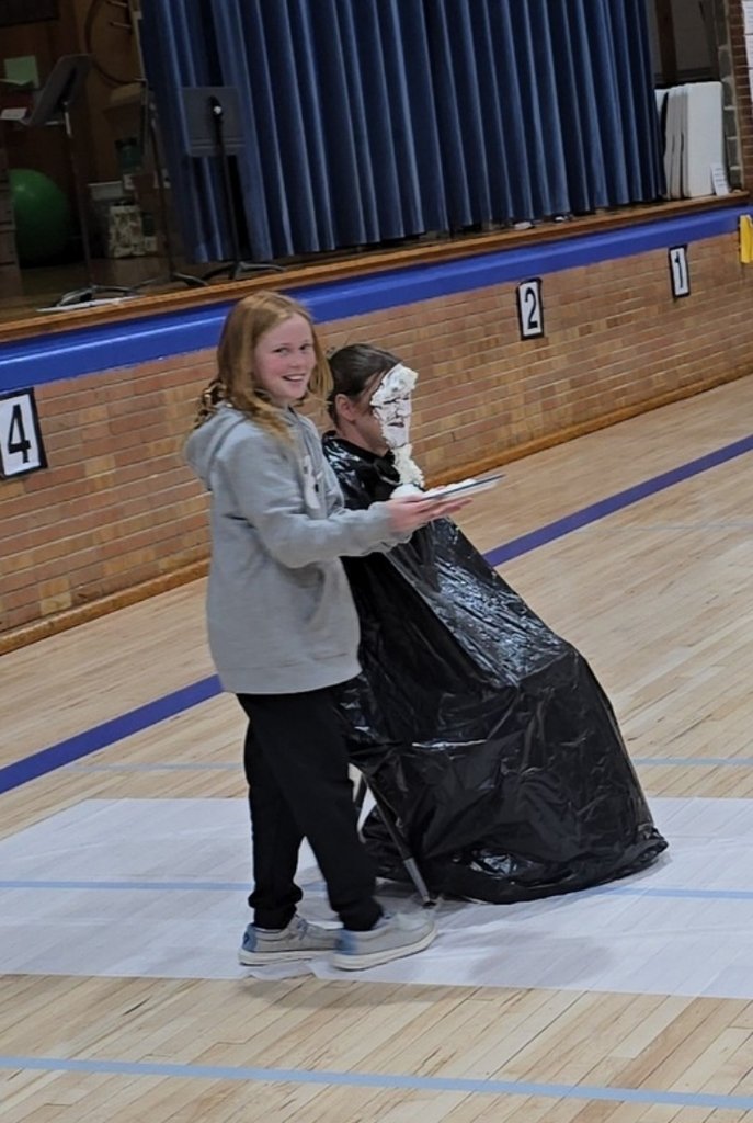 USD298Lincoln's tweet photo. KAY Club had a goal to raise $200 to make activity kits for Children's Mercy.  If the goal was met, the principal's would be pied.  If the goal was doubled, it would be two pies!  Thanks to an anyomous donation on behalf of the freshman class, they took their second pie tonight! https://t.co/1QISi85ui1