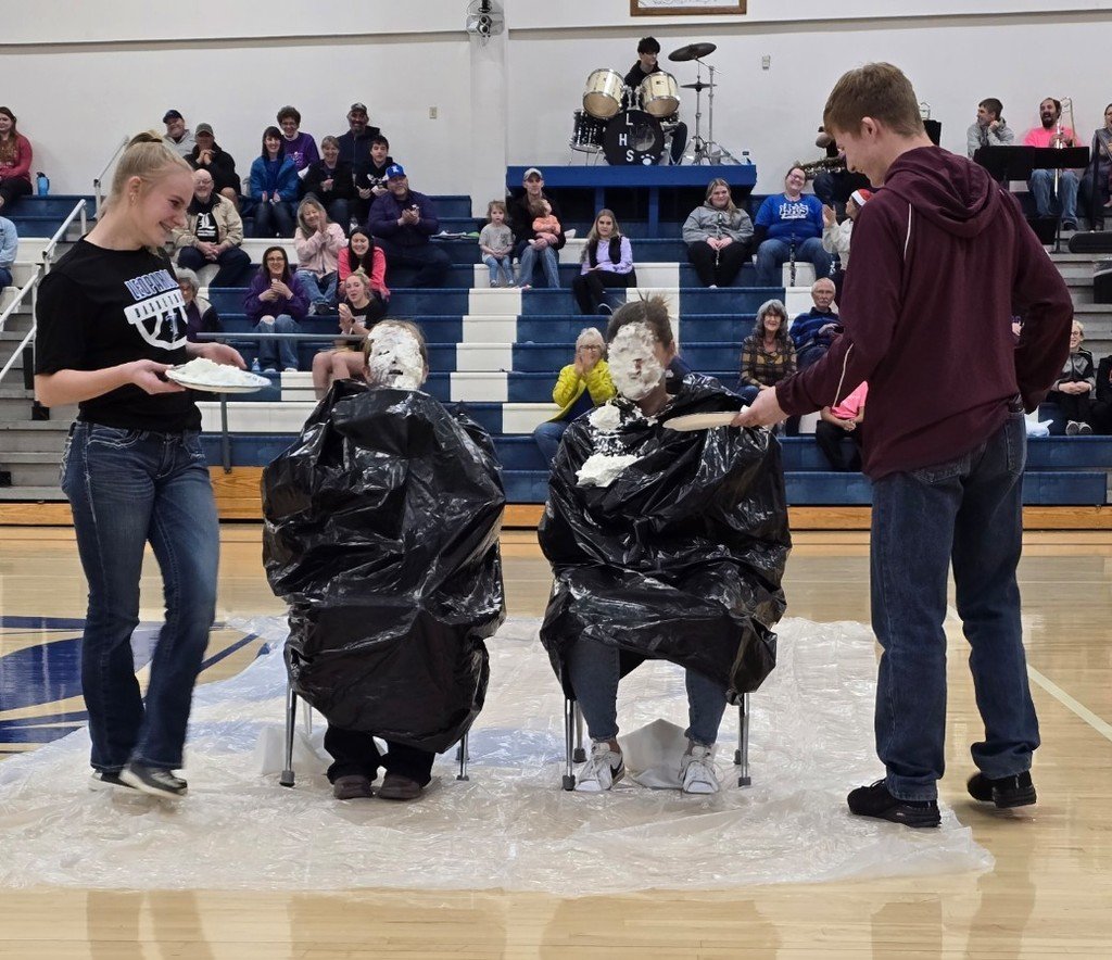 KAY Club had a goal to raise $200 to make activity kits for Children's Mercy.  If the goal was met, the principal's would be pied.  If the goal was doubled, it would be two pies!  Thanks to an anyomous donation on behalf of the freshman class, they took their second pie tonight!