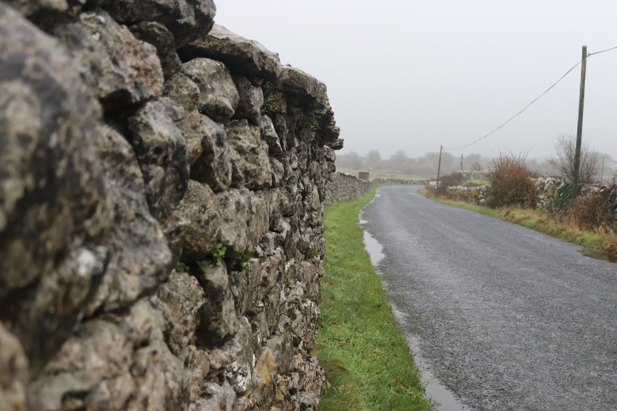 BDuffma's tweet photo. #365daysofwalking no escape from rain so far today- this eve of Christmas Eve....#Burren #StoneFences years of history in them walls!!π https://t.co/uJP5kav6im