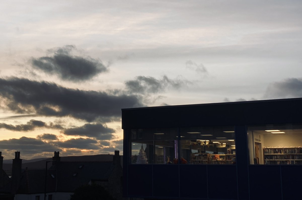 jm_stout's tweet image. Sunset in Lerwick, 2.50pm, and the wonderful @ShetlandLibrary all aglow