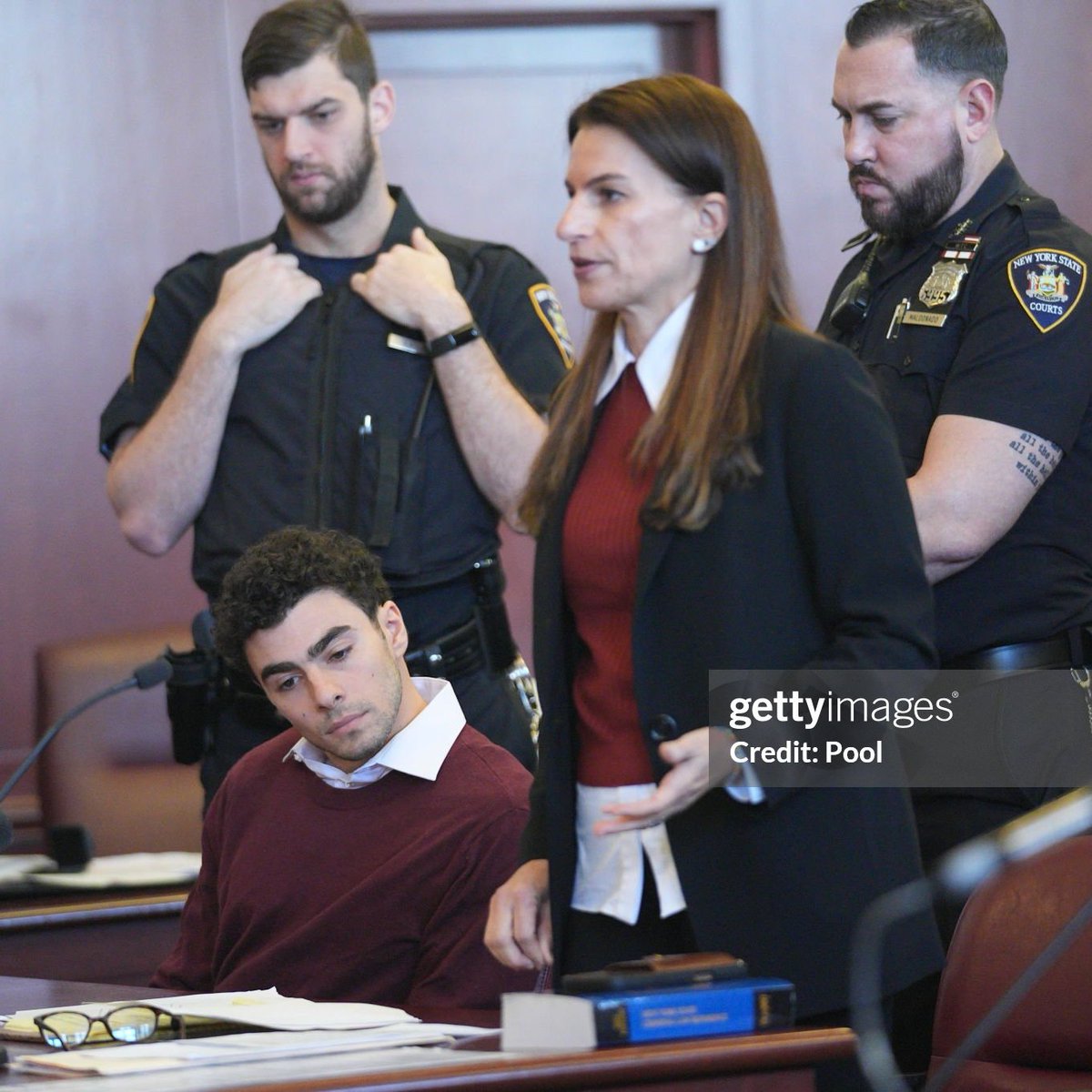 mangionethinker's tweet image. Luigi Mangione and his lawyer Karen Agnifilo wearing matching sweaters in court 🥹