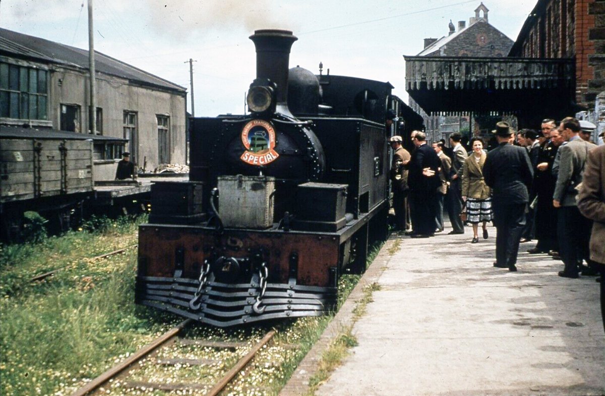 The last hurrah of the LRTL's tour of Irish lines was visiting the Tralee &amp; Dingle on 11 June 1953, reintroducing passenger workings after 14 years. A crowd gathered to see them off &amp; as no carriages remained, 2 vans were 'furnished' with wooden benches &amp; some off the platforms!