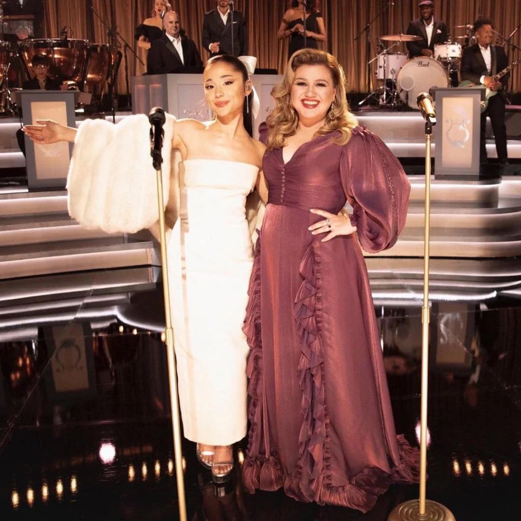 Ariana Grande &amp; Kelly Clarkson are the first artists to have holiday songs released this century reach the top 10 on the Hot 100:

#9: Santa Tell Me
#10: Underneath The Tree