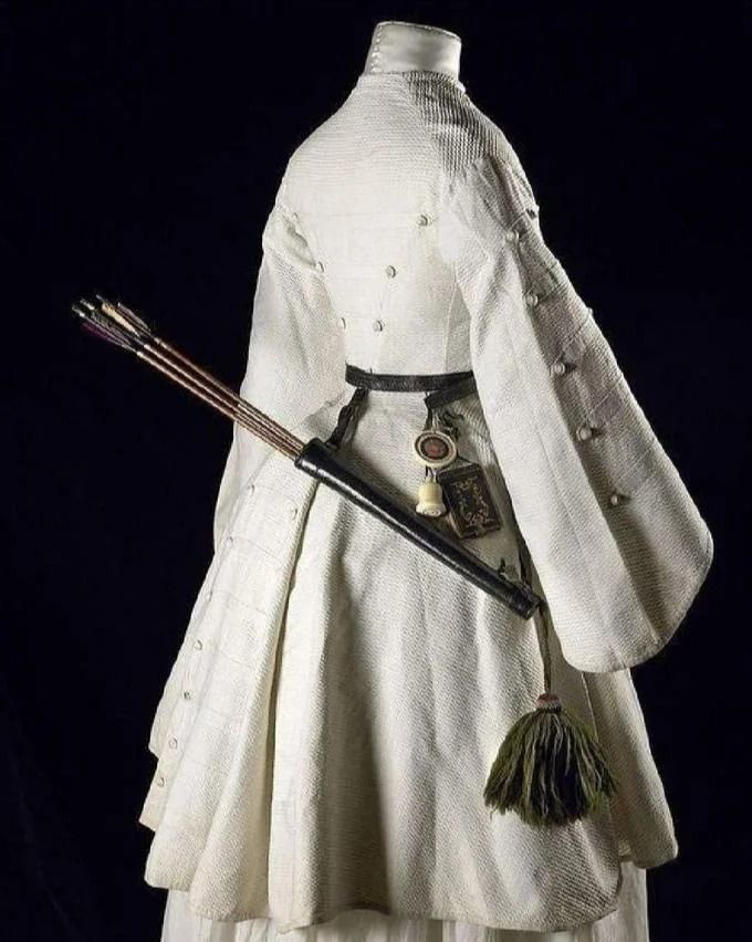 1860s female archery outfit with a pocket diary hanging from the belt