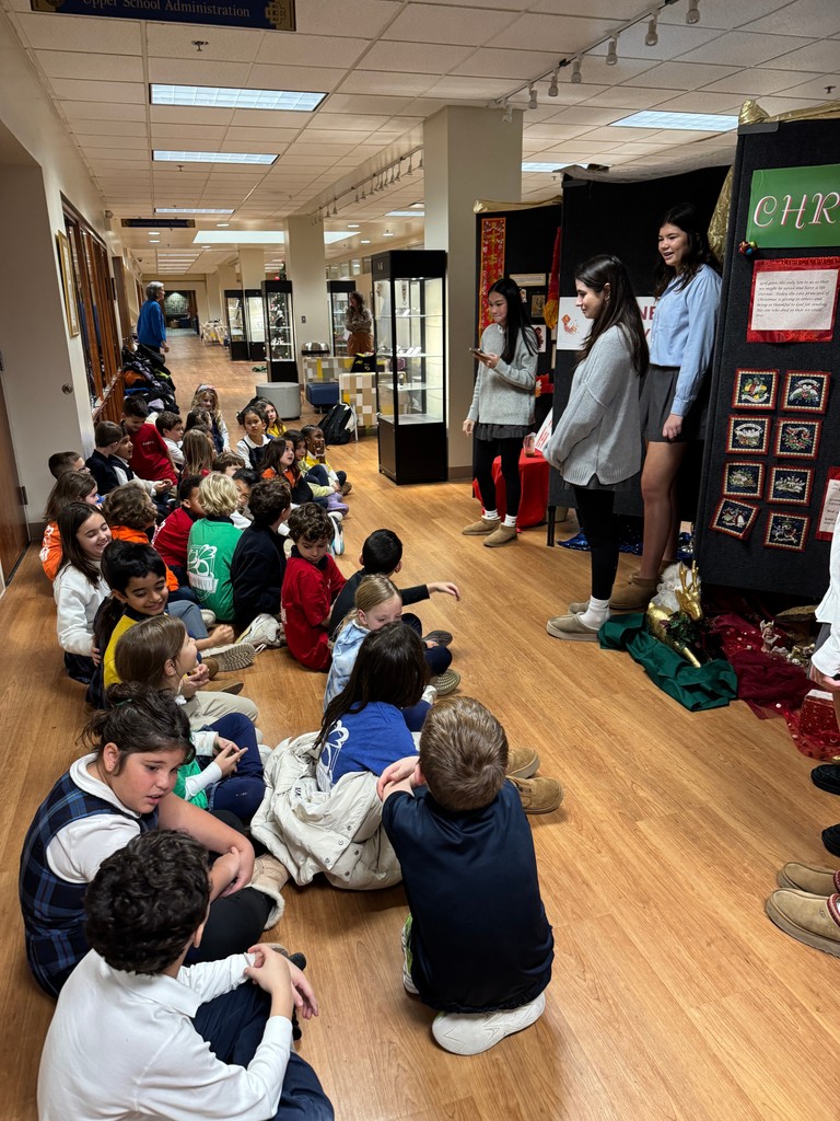 DCDSchool's tweet photo. The tradition continues as our second graders travel to the Upper School to learn about holidays our students celebrate. We are grateful our Upper School students do this each year, as it's wonderful to share our traditions and celebrations! #DCDSCommunity #HappyHolidays https://t.co/W6l8Mf8ZOa