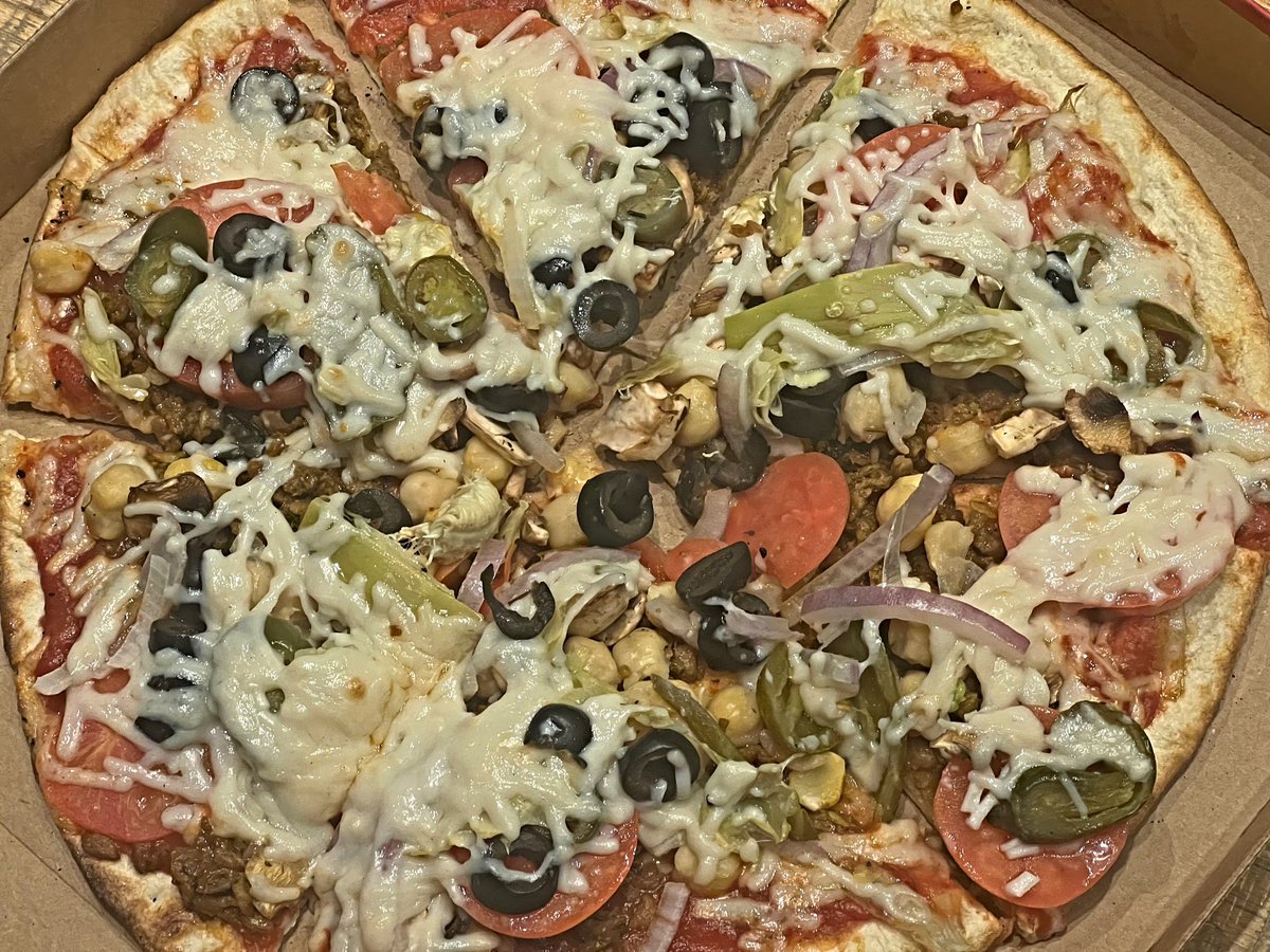 Robotvirgin's tweet photo. Vegan Pizza at MOD Pizza, a Pizza Restaurant in Tigard, OR; Vegan Sausage, Chickpeas, Daiya Cheeze, Tomato, Artichoke Hearts, Mushrooms, Olives, Jalapeño, Onion, Red Sauce, & Buffalo Sauce!
.
.
#veganpizza #veganmeat #vegan #veganfood #plantbased #veganism #modpizza #vegancheese https://t.co/VFngUNGkPS