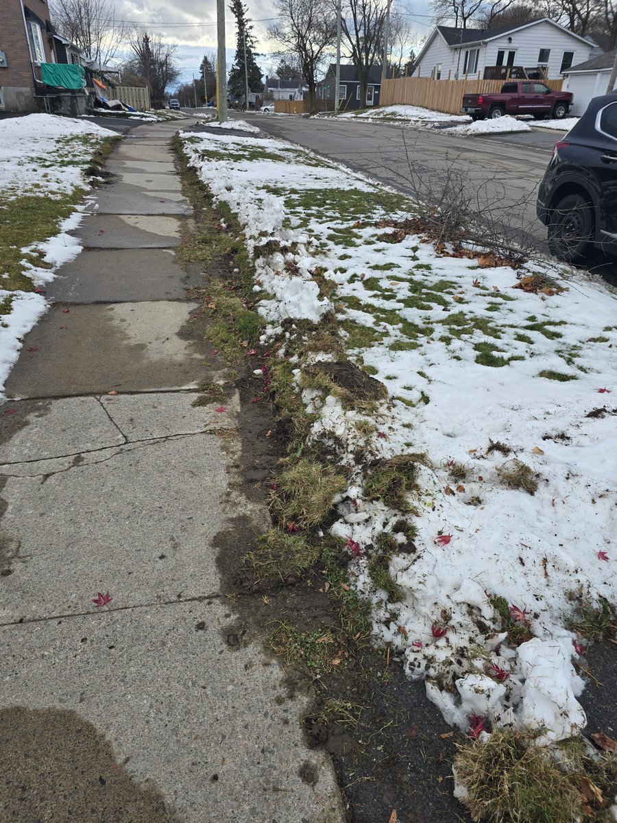 mclws21's tweet photo. I can't believe how incompetent the @cityofkingston sidewalk plow drivers are. It's snowed twice and each time they're driving further onto the grass and off the sidewalk. Just tearing apart my yard and packing the snow on my driveway using it as a turnaround point. https://t.co/1phcYT5BzT