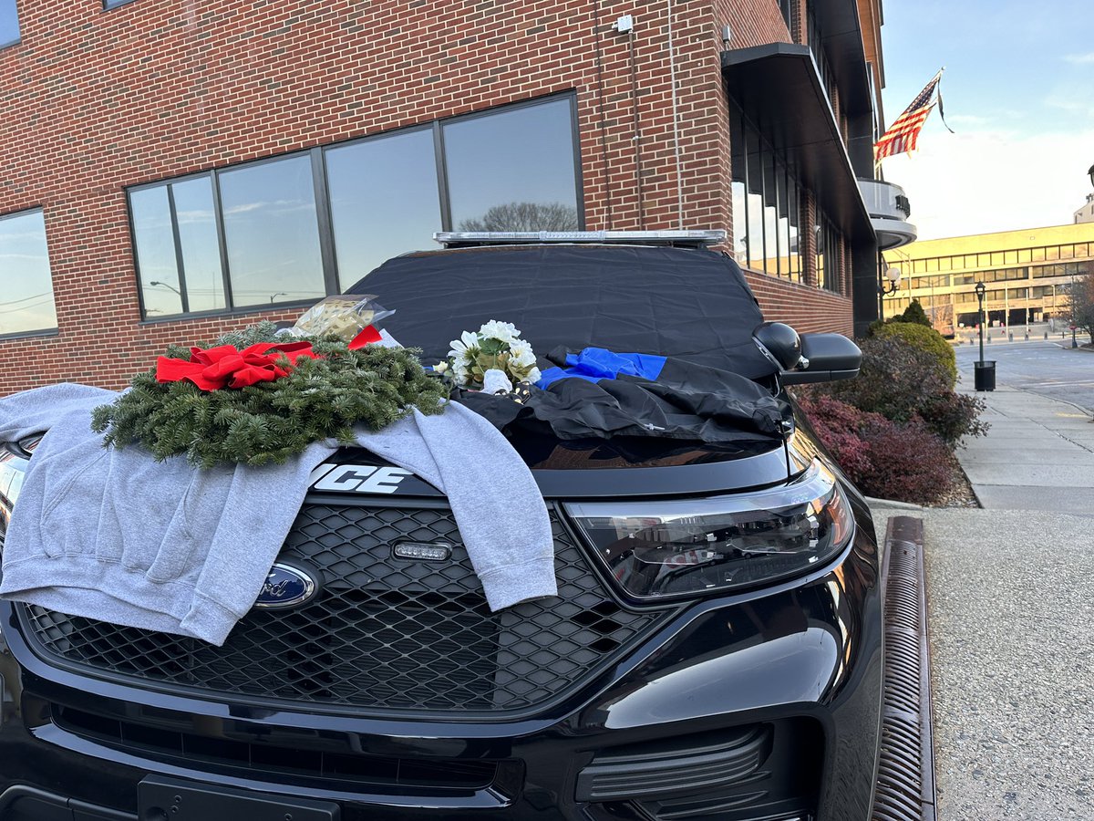 Fallen Officer Michael Horan’s memorial outside of GPD Headquarters this morning. Flowers, an Air Force sweatshirt and a holiday wreath are just some of the items left by the community to honor this hero. <a href="/SpecNews1RDU/">Spectrum News 1 RDU</a>