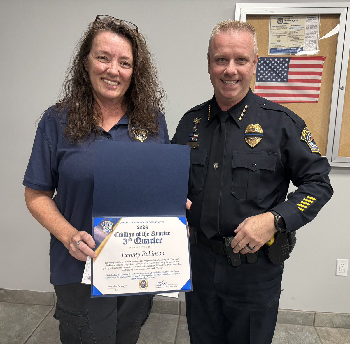 CoconutCreekPD's tweet photo. Chief Hofer recognizes Telecommunicator Robinson w/ a certificate as one of our Civilians of the Quarter. She, along with Telecommunicator Martilotto (not pictured), were in the #RealTimeCrimeCenter when they used cameras at Windmill Park to help ofcs arrest a vandalism suspect. https://t.co/9DDAPrU4qO