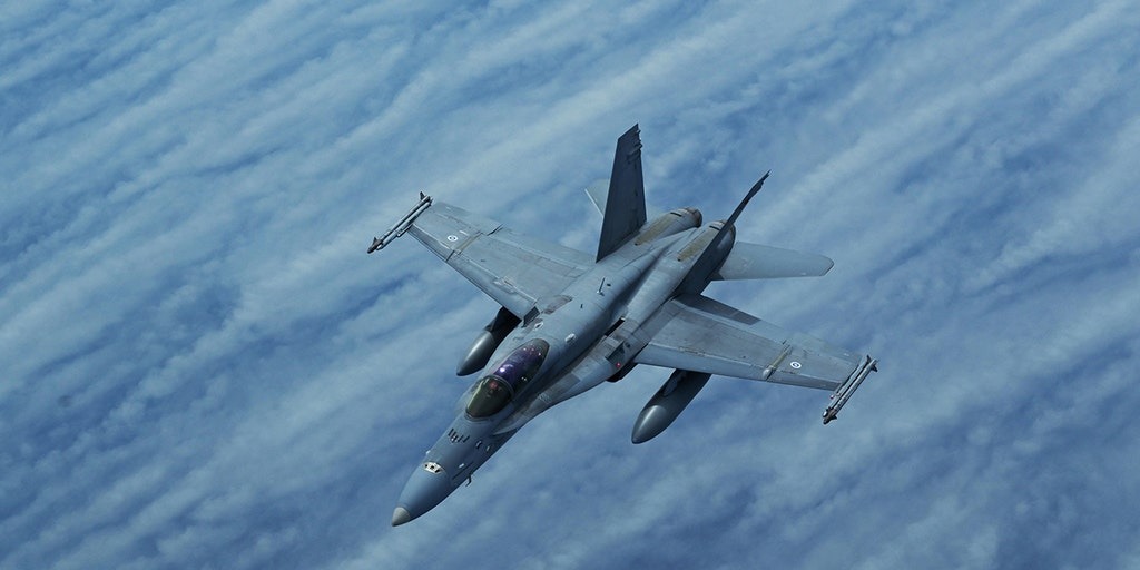 Breaking911's tweet photo. TWICE?! The same night a U.S. Navy jet was shot down by friendly fire, an F/A-18 Super Hornet narrowly avoided a surface-to-air missile fired from USS Gettysburg. The missile missed by just 100 feet as the jet prepared to land on the Harry S. Truman. https://t.co/3gxwIbXP8V