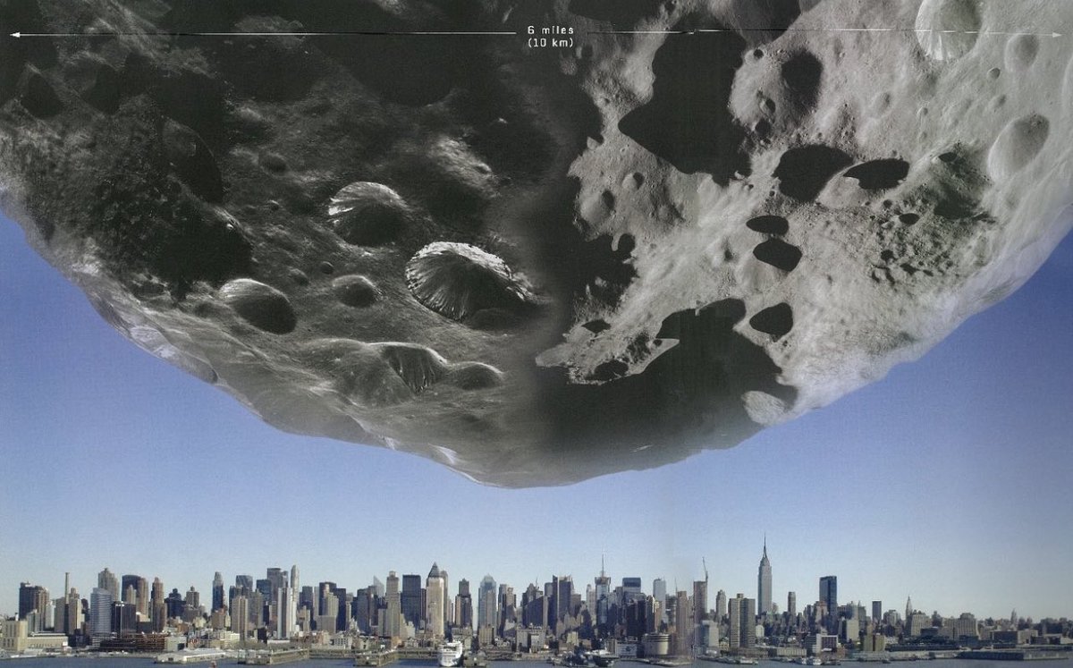 latestinspace's tweet image. The Chicxulub asteroid (6 miles across) that wiped out the dinosaurs compared to downtown Manhattan 😱
