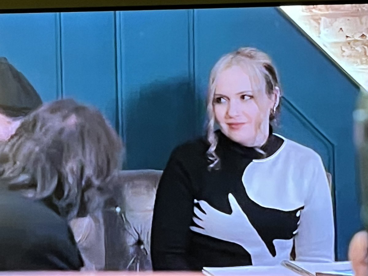 DerekHeron's tweet photo. I’m just watching ‘Jonathan Ross Haunted Homecoming’ on Really (Virgin Ch 128)

The sweater Paranormal Researcher, @KateCherrell is wearing appears to be groping her breasts. https://t.co/6bmrQWCSRi