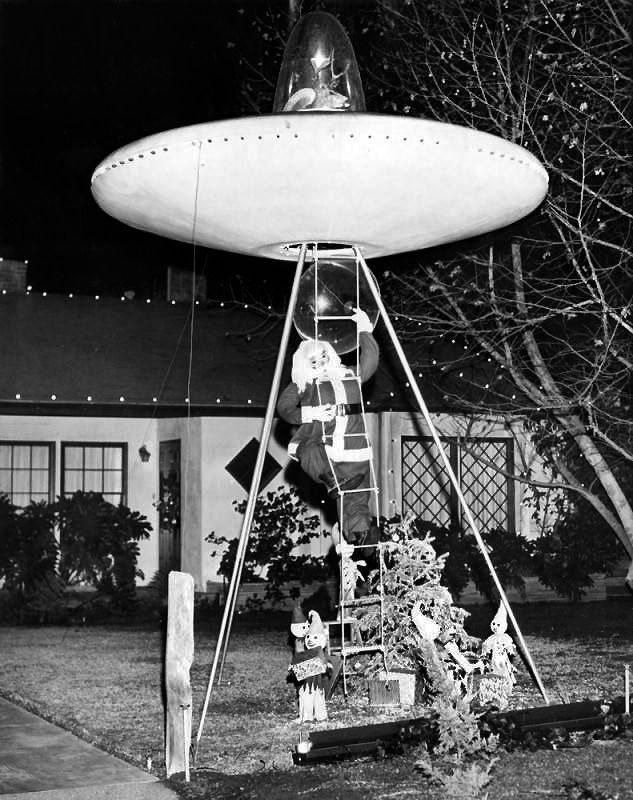 [1958] "This Santa Claus in the front lawn of Jasper L. Jones residence, 18624 Calvert Ave., Reseda, travels by flying saucer." (Valley Times Collection) buff.ly/489glJw