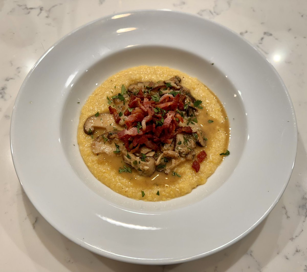 futurevictim_'s tweet image. tonight’s dinner gruyere polenta with mixed mushrooms and bacon. was gonna put some shrimp in there but the ones i bought somehow spoiled so fuck shrimp. we are leaving shrimp in 2024