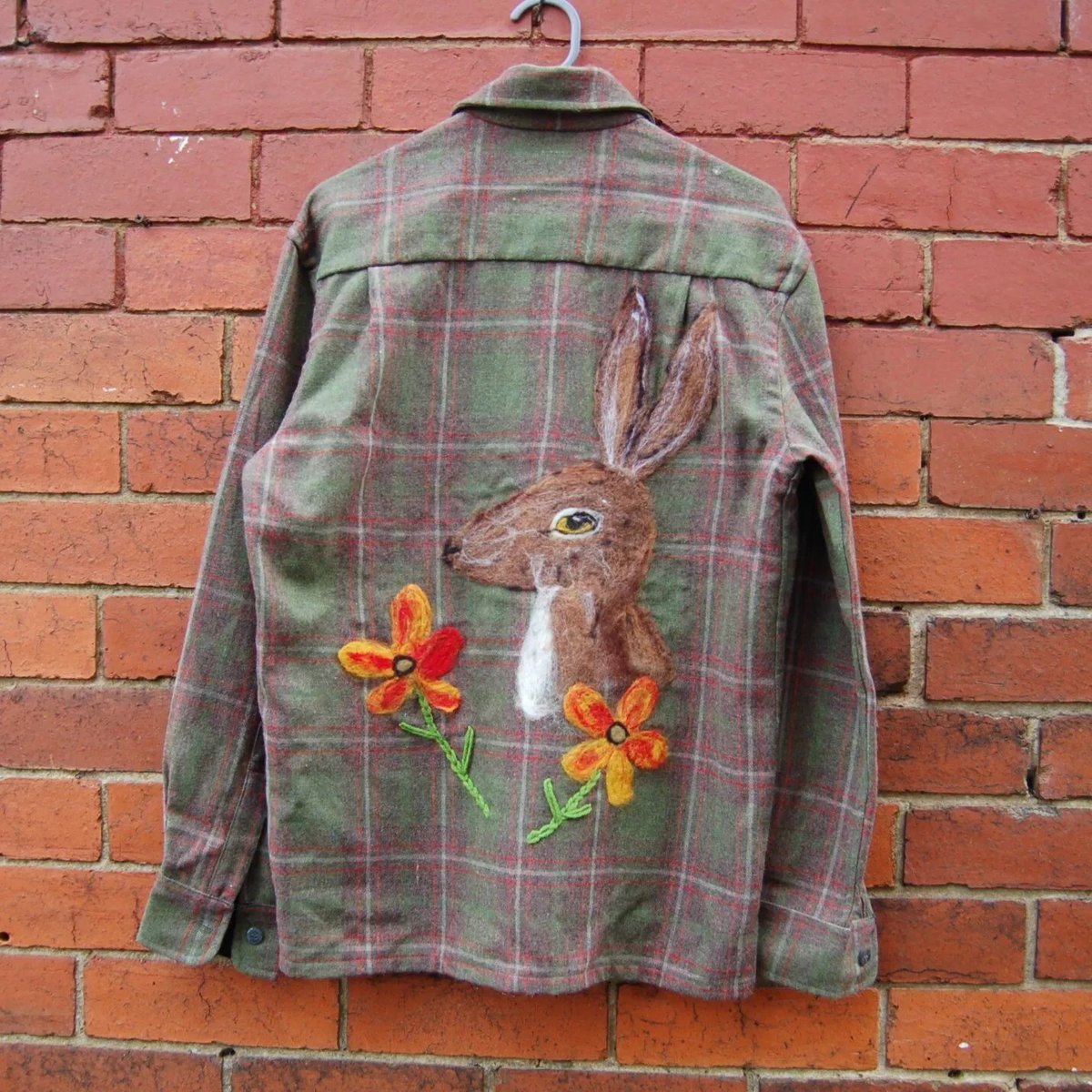 Yorkshireharec1's tweet photo. Wool shirt upcycled reworked with needlefelted wool Hare and flowers on back https://t.co/u8m2XXoex4 #eBay via @eBay_UK https://t.co/knfKRhVNsX