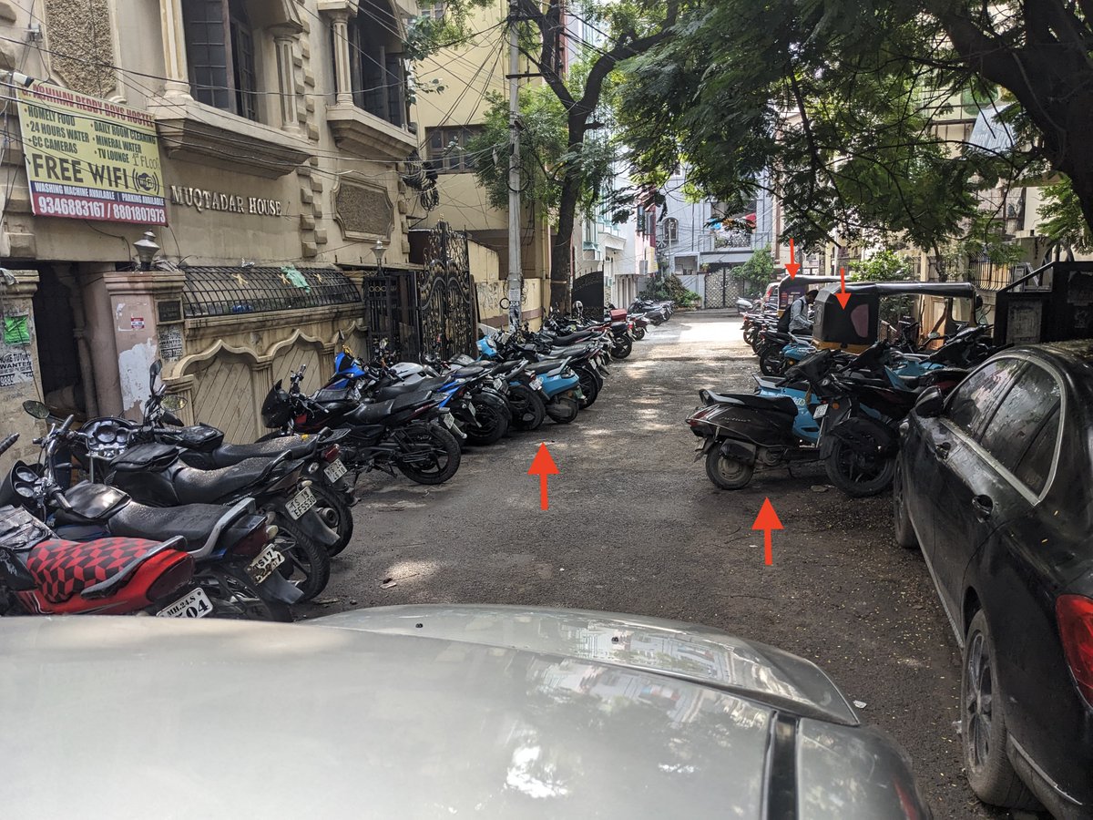 philosafi's tweet photo. Illegal Bike Parking:

- Predominantly by men's hostel residents, many of whom are gig workers (Swiggy, Zomato, Porter, etc.), residing in hostels with potentially illegal licenses. 
 
- Workers from nearby malls leave bikes unattended, crowding streets. https://t.co/oR1EGJjuFA