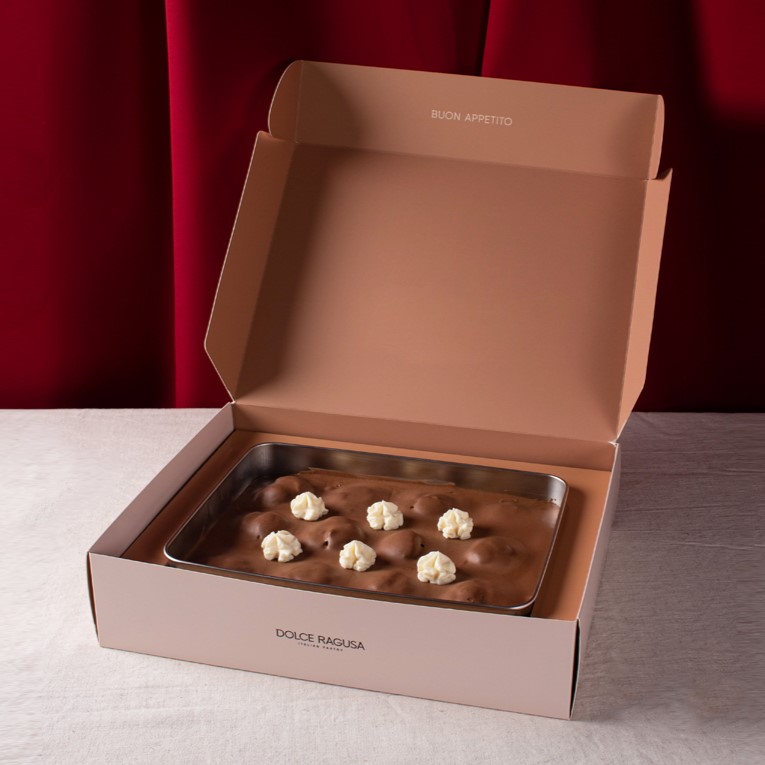 DQliving's tweet photo. Celebrate the holidays with a taste of Italy from @dolceragusa! This festive season, delight your guests with their #NewYear offerings of Profiterole Trays, crafted with the finest ingredients. Choose from their delicious flavors: Dark Chocolate, White Chocolate, and Pistachio. https://t.co/gBYK1iJJ4G