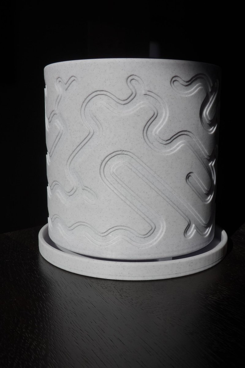 DataNeel's tweet photo. randomly generated art on a 3d printed plant pot I designed as a Christmas gift. It wraps seamlessly around the pot, and the drip tray holds it up like it’s floating

made with javascript and fusion 360. Download it here:

https://t.co/tC6gXJemze

https://t.co/cnirK66N9X https://t.co/Os86YXzZVf