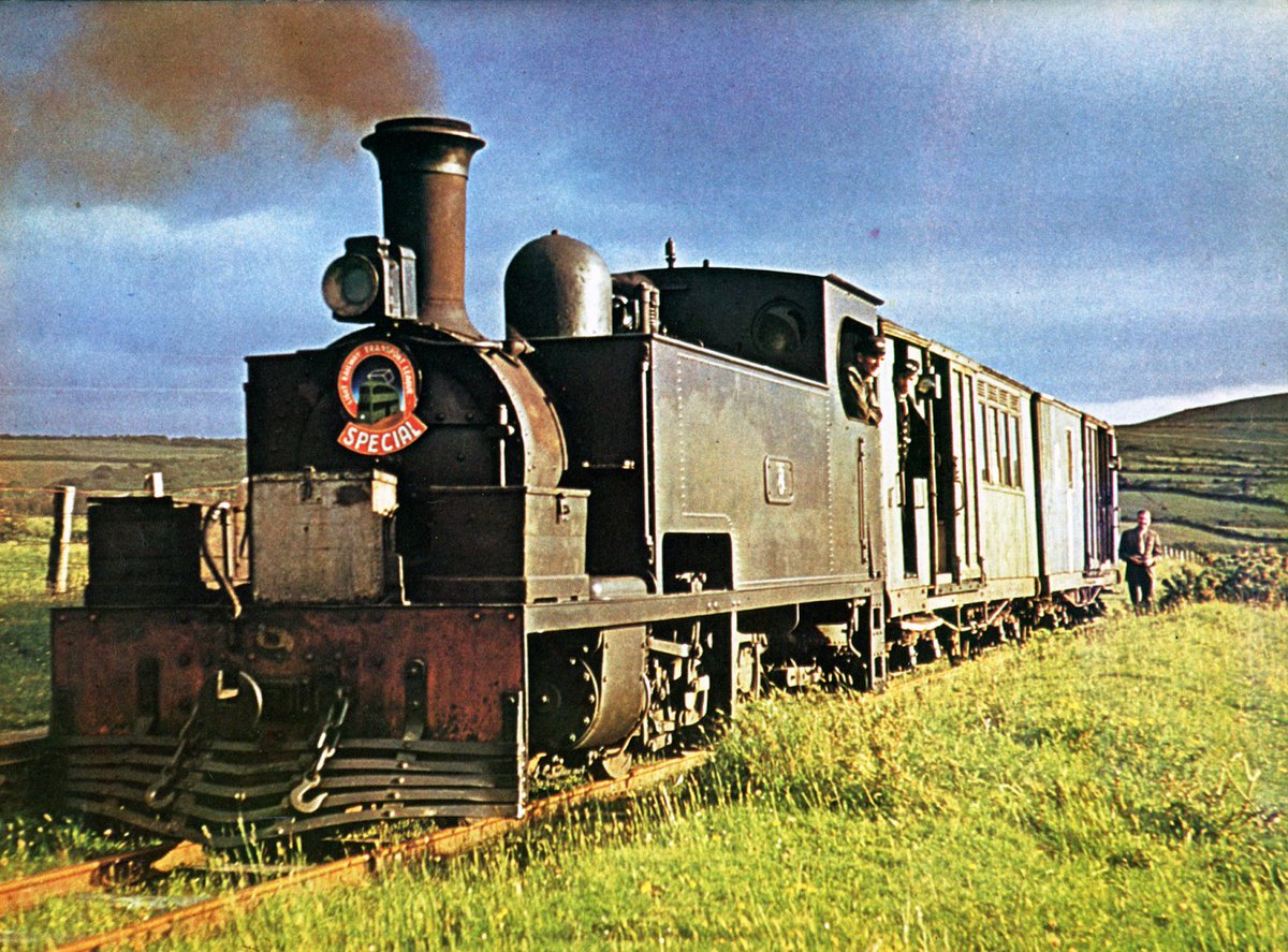 At Garrynadur, another photo stop was taken for those willing to trek down the line a mile to Lispole Viaduct - Jim M. Jarvis being one of the enthusiasts foolhardy enough, taking a shot of 8T before leaving. From Garrynadur, the line fell at 1 in 29 for a mile before Lispole.