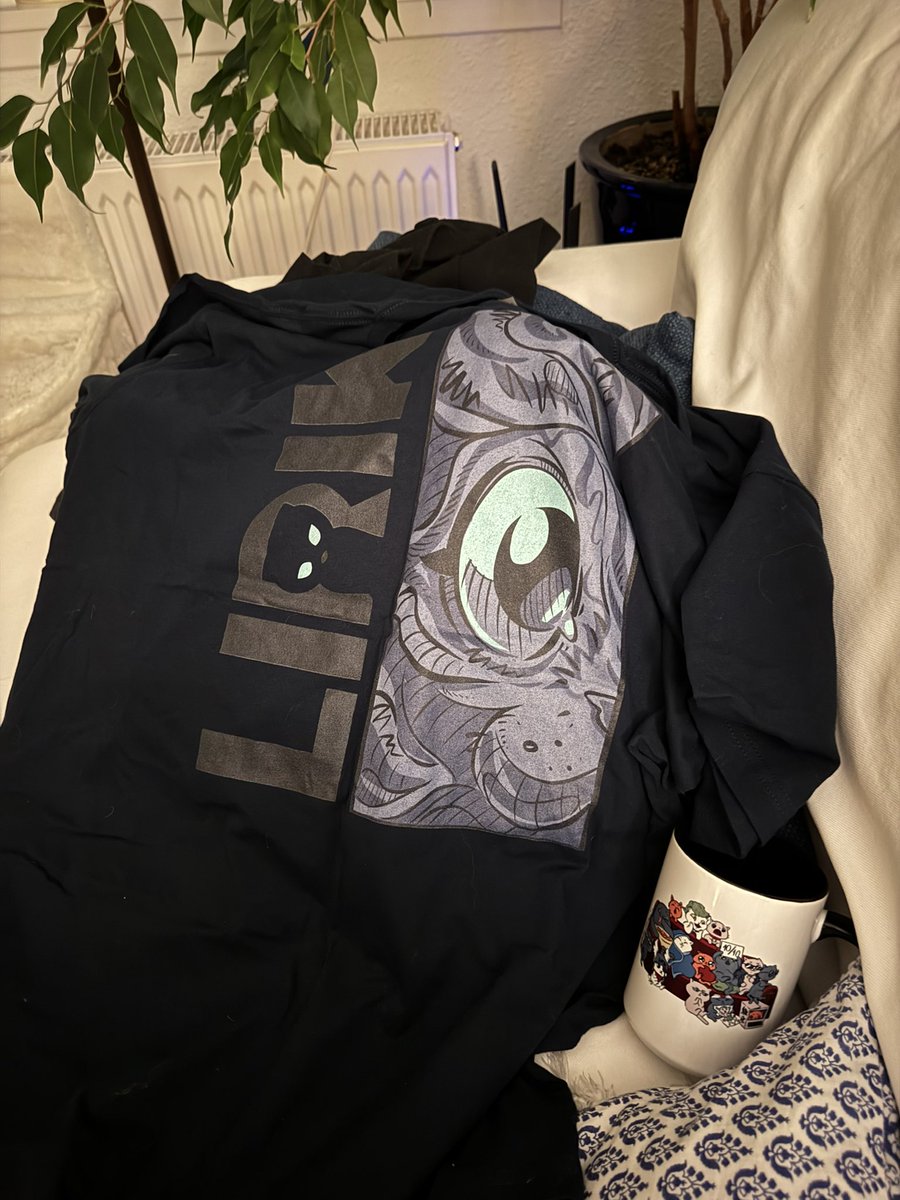 Thennov's tweet photo. My gf got me this @LIRIK shirt and mug for my birthday today. First lirik merch after 10+ years of subbing to him on Twitch. I’m over the moon with happiness 😍 https://t.co/rOwWiubLfH