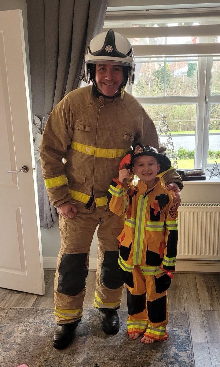 After a busy Xmas Eve shift, I just made it back in time for present opening... really proud of him given that he's full of a 🤮 bug, so i couldn't resist a request for a joint uniform pic with his gift off the big man 🧑‍🎄 💙 #family