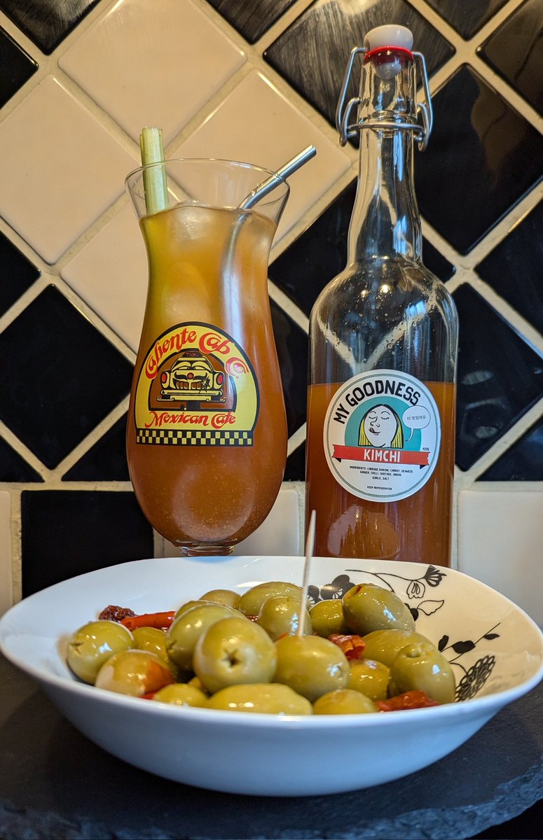 Sav (@sav70) on Twitter photo Kimchi Bloody Mary (mix from <a href="/mygoodnessfood/">My Goodness</a>) , olives, loungewear, and Magnificent Seven on the TV. #StStephensDay #BoxingDay. Kimchi Bloody Mary (mix from <a href="/mygoodnessfood/">My Goodness</a>) , olives, loungewear, and Magnificent Seven on the TV. #StStephensDay #BoxingDay.