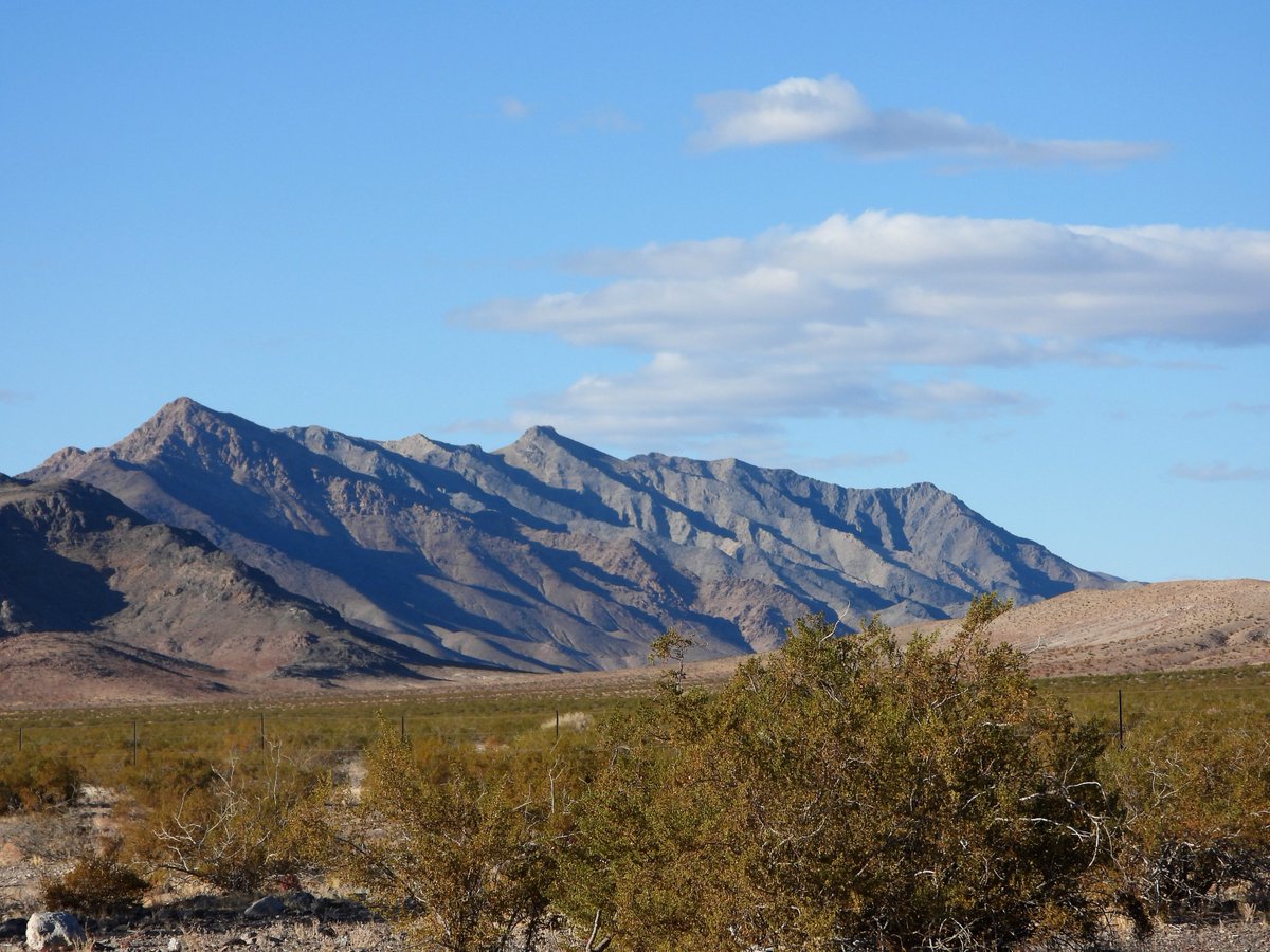 Landscapes we thought would always be there are now on the chopping block, This is the east side of Bare Mountain leading into Crater Flat, Nevada. NV Energy is planning on building the Greenlink West Transmission line here with 180 foot towers every 1/8th mile.