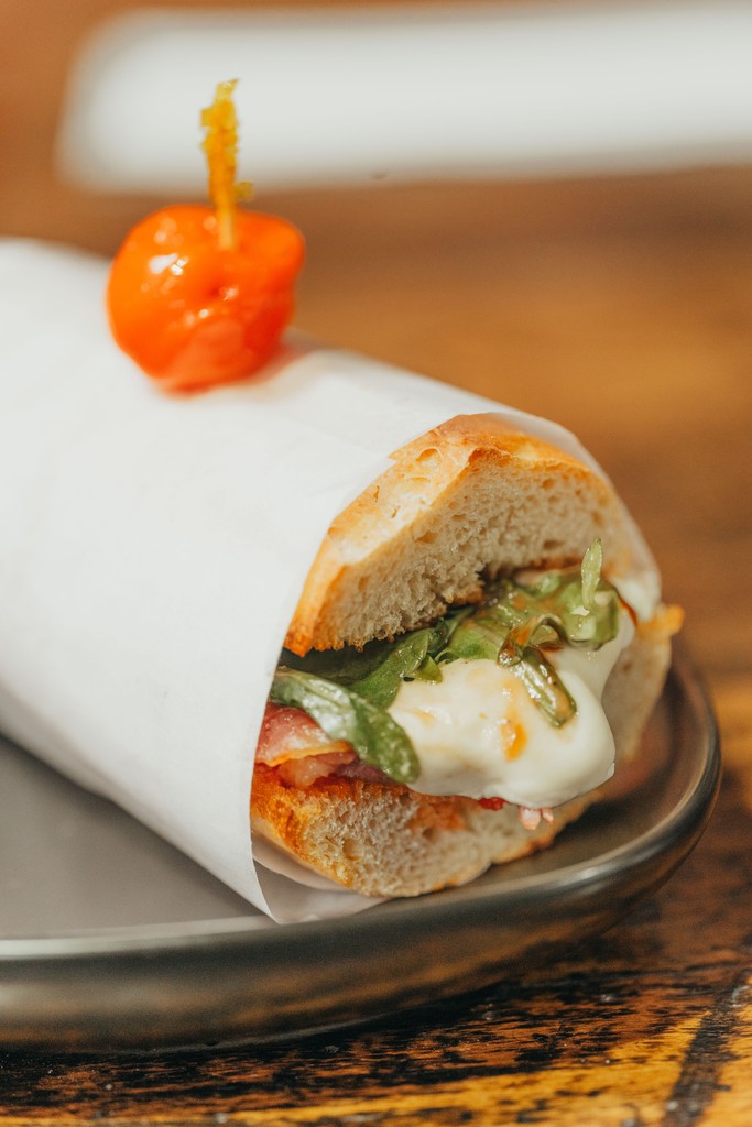 oldsoulco's tweet photo. 🥖Pane Prosciutto! Enjoy the perfect combination of prosciutto, fresh mozzarella, flavorful peperonata, Peppadew pepper, crisp arugula, and a drizzle of balsamic dressing, all nestled in our house-made baguette. https://t.co/yFqBecKmQ9