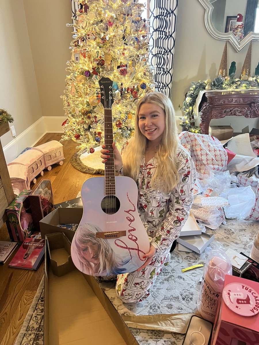bamajvc1's tweet photo. @taylornation13 @taylorswift13 Lover guitar for my daughter!  We love Taylor!  TTPD black set also!  ❤️ https://t.co/P6jqZdFJep
