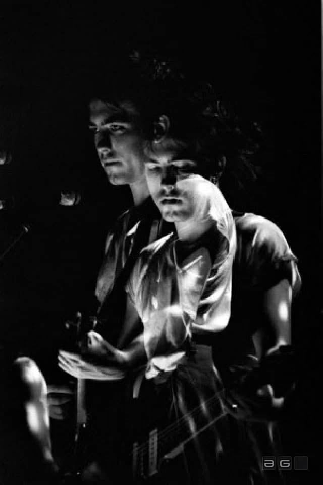 The Cure by David Corio

"The band was a photographer’s nightmare. Their publicist stipulated that no flash-guns were allowed on cameras but failed to mention that they performed in near-total darkness. I used a shutter speed of a few seconds hoping to get something and got them"