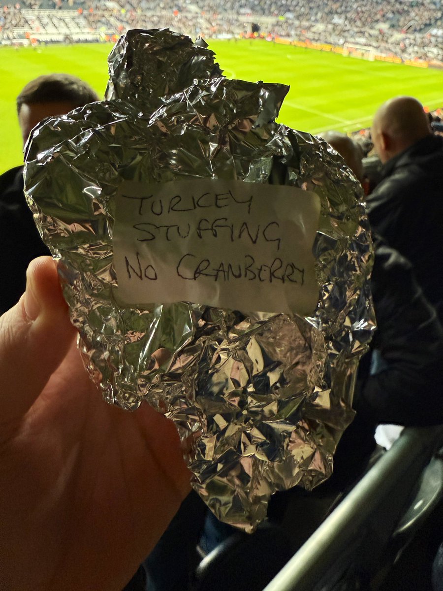 ketchell's tweet photo. One of our lot in the Strawberry Corner does Christmas leftover sarnies each year - 30+ handed out at halftime 🖤🤍 https://t.co/C7JO5eSvgc