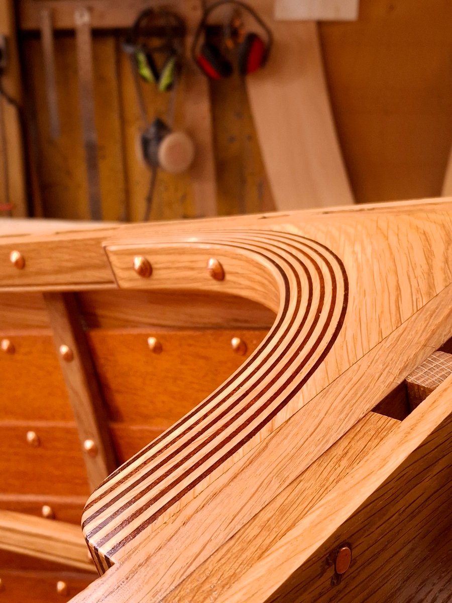 Combining modern and traditional, this Everson 11 clinker dinghy, built by Woodbridge and Waldringfield Boatyards, features epoxy-laminated oak knees and breasthook with a mahogany veneer pinstripe. We can't wait to see her sailing!

#westsystemepoxy #boatbuilding #woodenboats