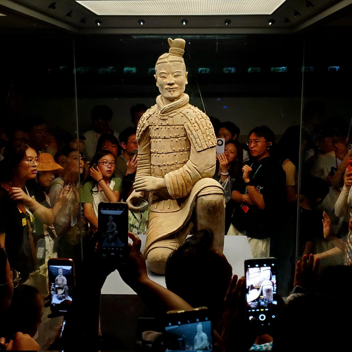 My favorite picture in my camera roll from 2024, and perhaps one of the best shots I've ever taken.

Out of thousands of warriors, this is the only statue to have been recovered completely intact...

...and its importance is spelled out in the faces of the onlookers.