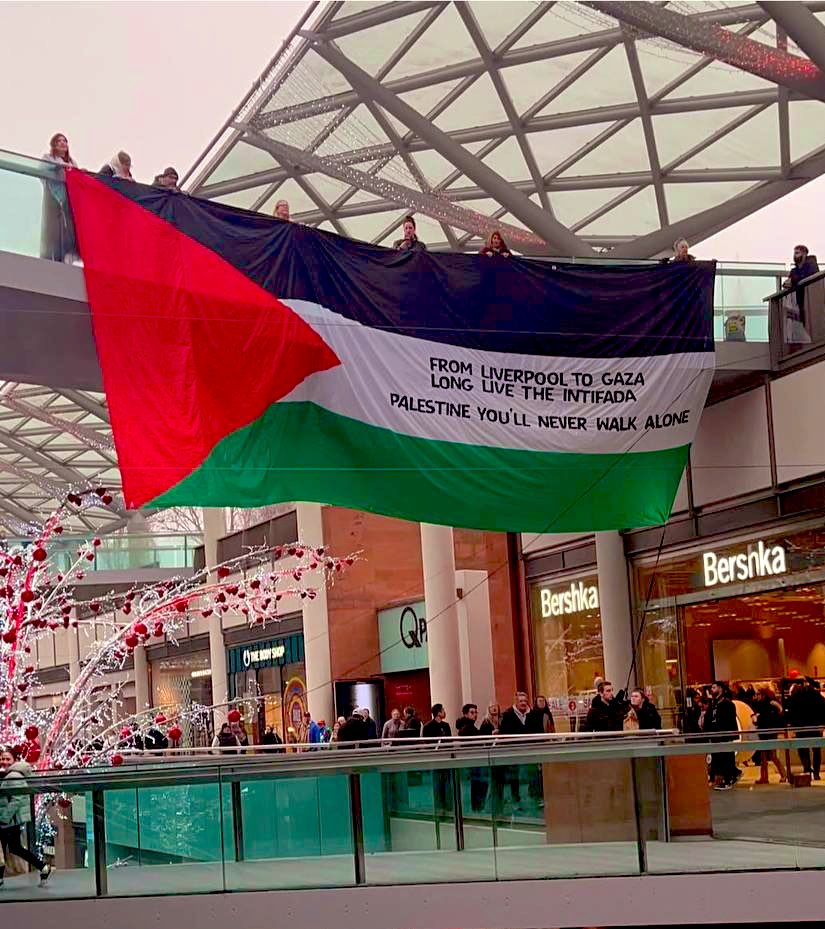 OnlinePalEng's tweet photo. "Long Live the Intifada" 🇵🇸✌🏻

A huge flag drop in a shopping center in Liverpool, UK. https://t.co/HNqgI5QKDC