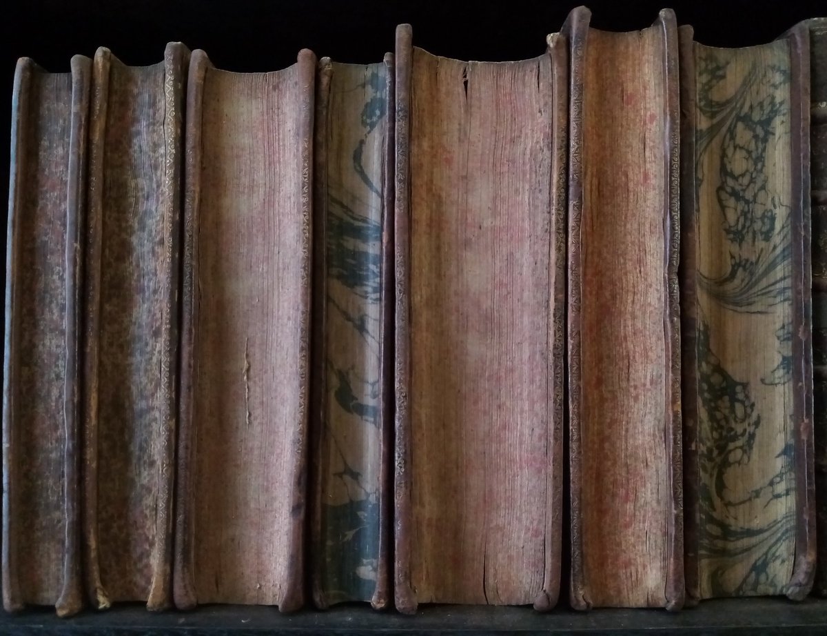MarshsLibrary's tweet image. Some lovely gold-tooled spines &amp;amp; what's on the other side of those spines! #Bindings #Marbling