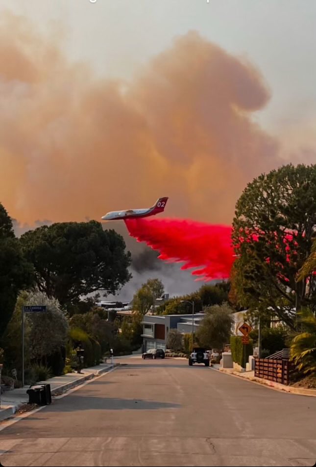 My daughter’s next door neighbor took this. Bless those pilots. Her house is 50 yards from massive fire face.