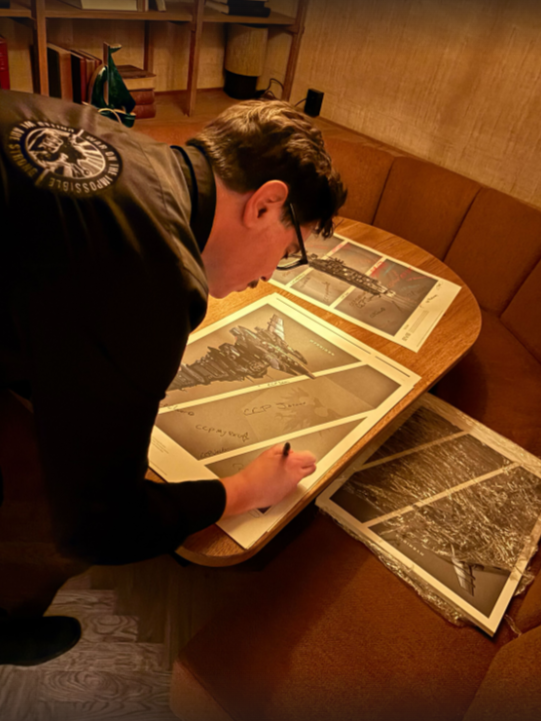 Signing a poster

#tweetfleet I @eveonline 🚀