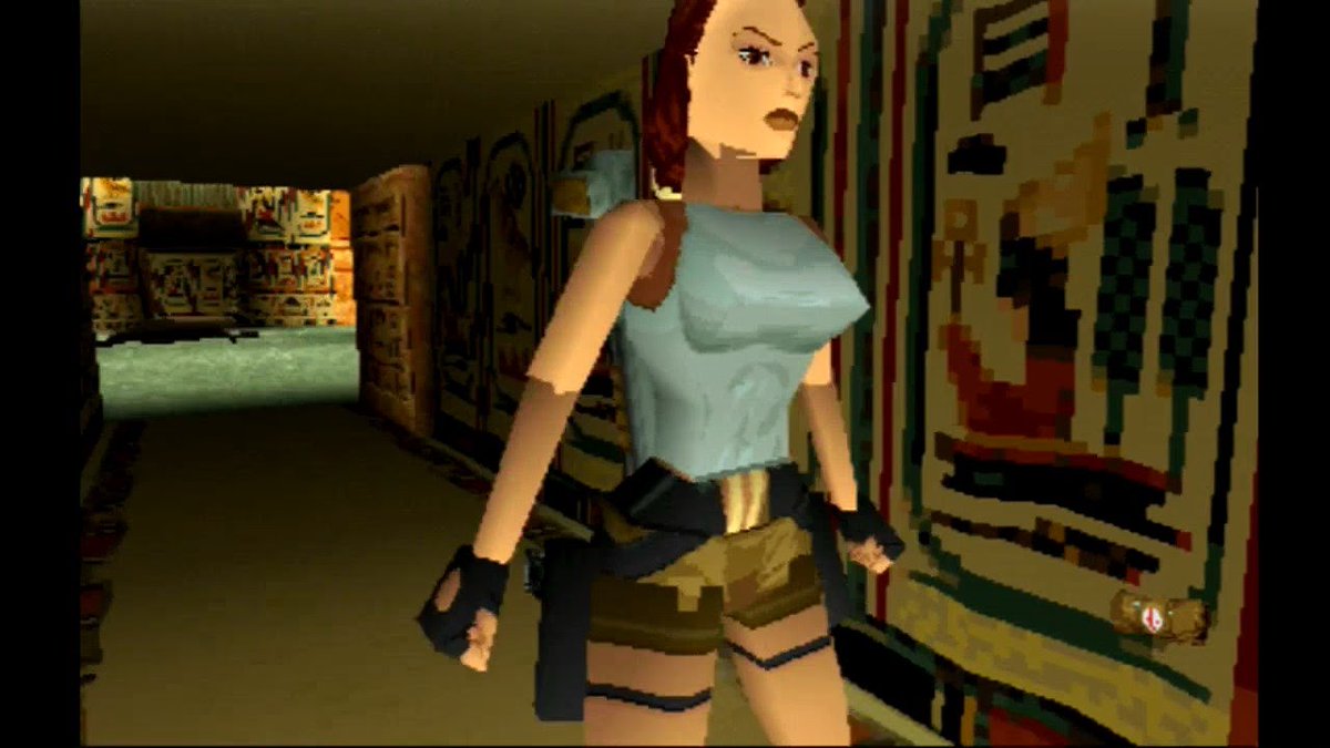 White tank top, booty shorts, work gloves, and 2 polygons were peak design in the 90's. A sign of a strong woman who could and would beat sense into you.