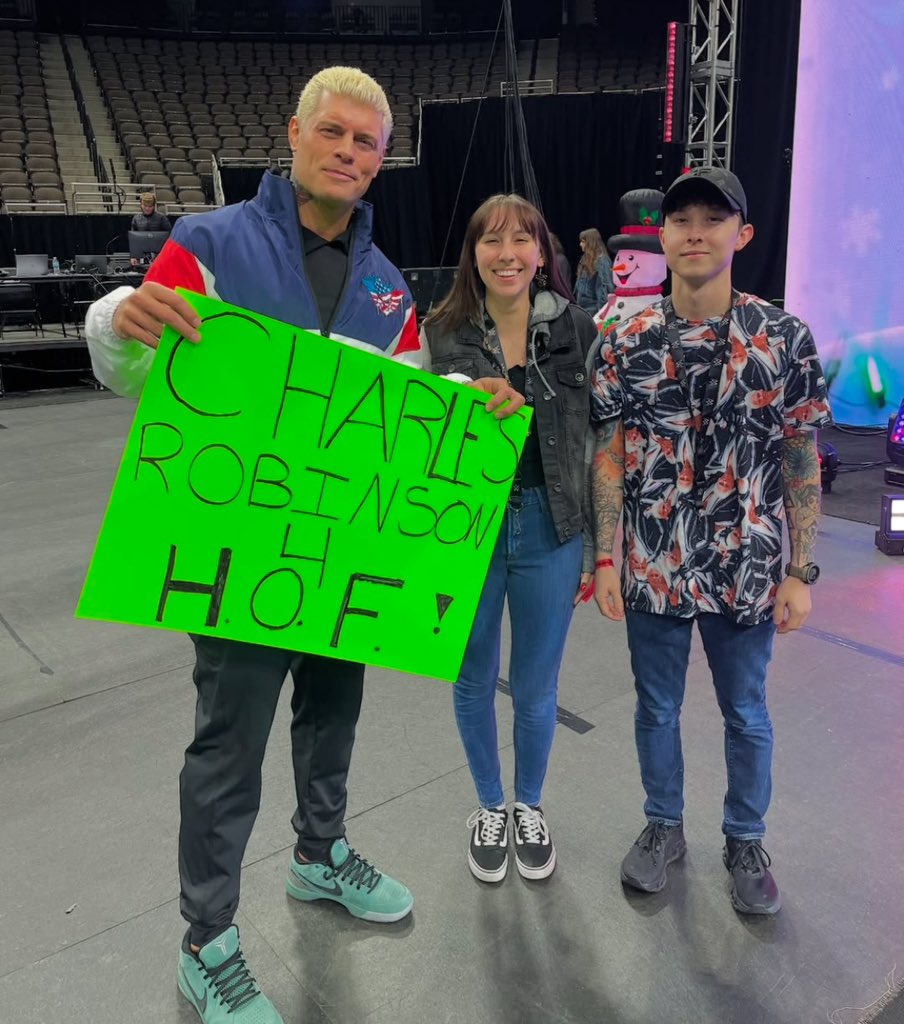 Why does <a href="/CodyRhodes/">Cody Rhodes</a> make signs like this? 😂