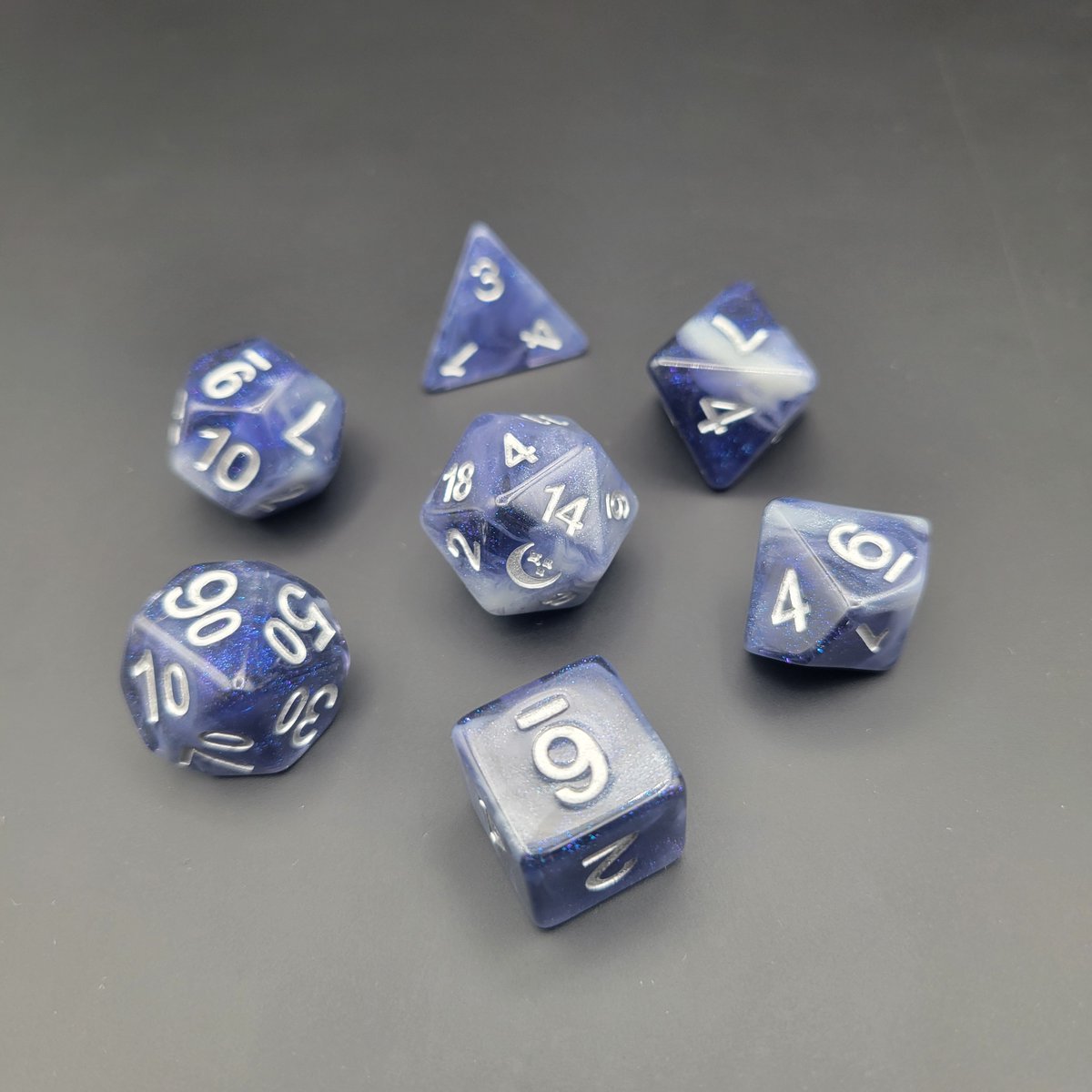 Time to reveal what was inside our 2024 Dice Advent Calendars! First up is our standard edition.

Missed out on the calendars but want the goodies? Good news! The dice and other loot are now available dicebound.com