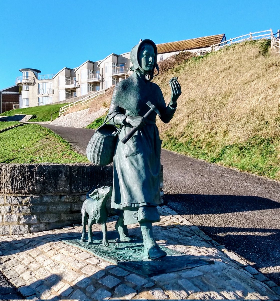 Lyme Regis looking sparkling in the winter sunshine. Statue is Mary Anning the renowned fossil hunter.